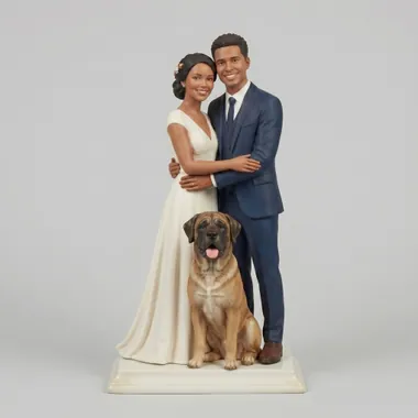 Custom wedding cake topper of a Black couple with their large dog.